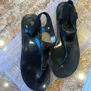 Sandals with a soft sling cushion